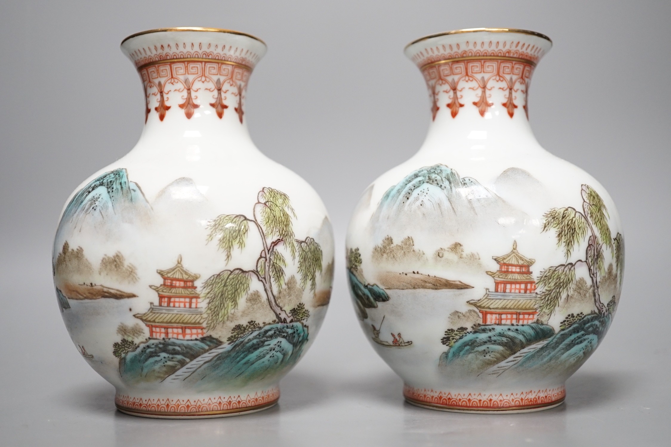 A pair of Chinese enamelled vases, 15cms high